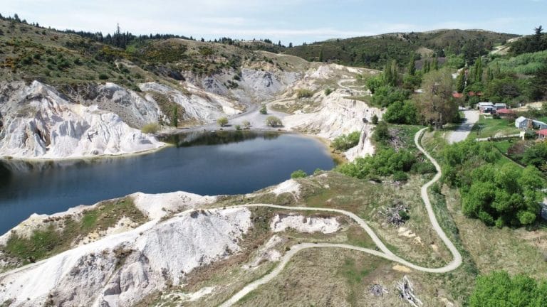 Drone view of the loop walk around St Bathans Blue Lake
