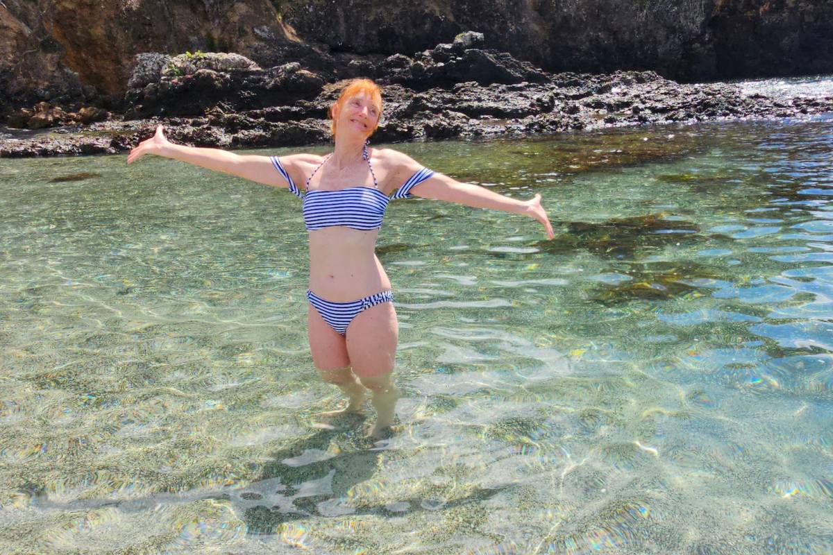 Sandra enjoying the crystal clear water at Roberton Island